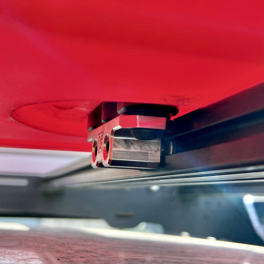Billet aluminum Rotopax mount adapter for extrusion roof rack cross bars. - Premium Truck Accessory by Xtreme Canopies