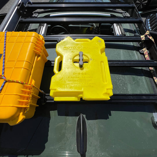 Billet aluminum Rotopax mount adapter for extrusion roof rack cross bars. - Premium Truck Accessory by Xtreme Canopies