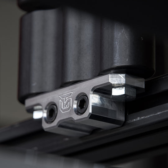Billet aluminum Rotopax mount adapter for extrusion roof rack cross bars. - Premium Truck Accessory by Xtreme Canopies