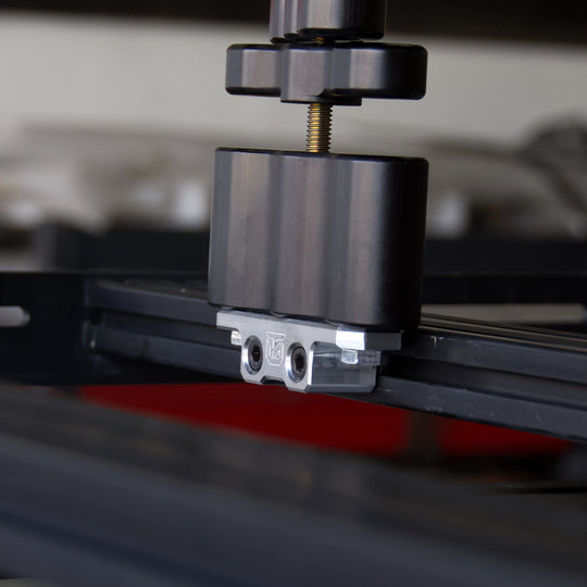 Billet aluminum Rotopax mount adapter for extrusion roof rack cross bars. - Premium Truck Accessory by Xtreme Canopies