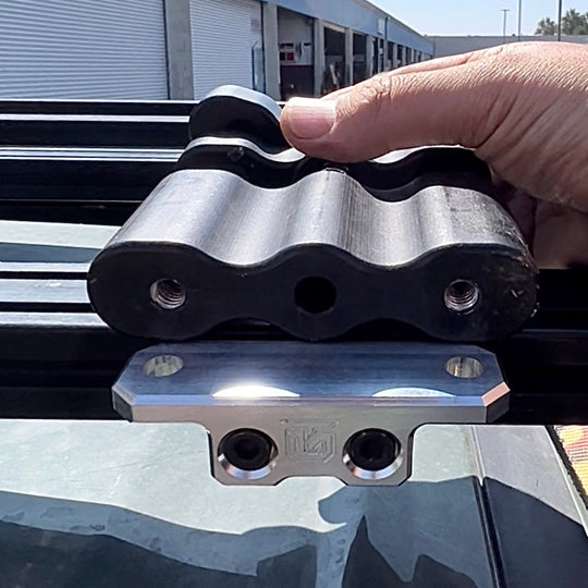 Billet aluminum Rotopax mount adapter for extrusion roof rack cross bars. - Premium Truck Accessory by Xtreme Canopies