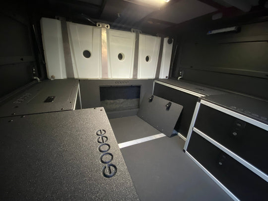 Alu-Cab Alu-Cabin Canopy Camper - Lower Bulkhead Panel - Premium Camper by Xtreme Canopies