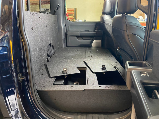 Ford Super Duty Ford - F250-F550 - 2023-Present - 5th Gen. Crew Cab - Second Row Seat Delete Plate System with Factory B&O Subwoofer Center Wall with Exterior Port - Premium Seat Delete Plate System by Xtreme Canopies