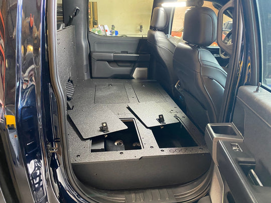 Ford Super Duty Ford - F250-F550 - 2023-Present - 5th Gen. Crew Cab - Second Row Seat Delete Plate System with Factory B&O Subwoofer Center Wall with Exterior Port - Premium Seat Delete Plate System by Xtreme Canopies