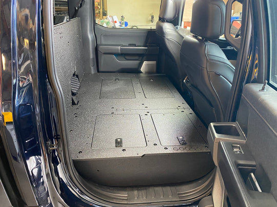 Ford Super Duty Ford - F250-F550 - 2023-Present - 5th Gen. Crew Cab - Second Row Seat Delete Plate System with Factory B&O Subwoofer Center Wall with Exterior Port - Premium Seat Delete Plate System by Xtreme Canopies