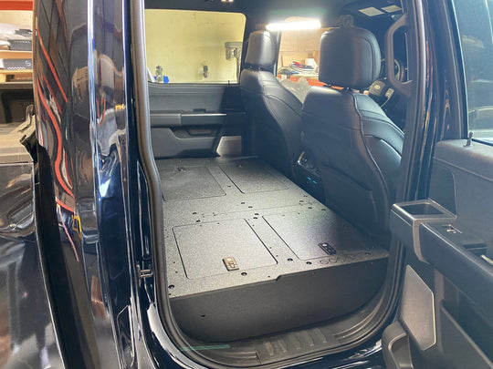 Ford Super Duty Ford - F250-F550 - 2023-Present - 5th Gen. Crew Cab - Second Row Seat Delete Plate System with Factory B&O Subwoofer Center Wall with Exterior Port - Premium Seat Delete Plate System by Xtreme Canopies