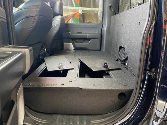 Ford Super Duty Ford - F250-F550 - 2023-Present - 5th Gen. Crew Cab - Second Row Seat Delete Plate System with Factory B&O Subwoofer Center Wall with Exterior Port - Premium Seat Delete Plate System by Xtreme Canopies
