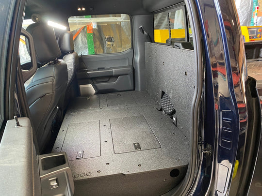 Ford Super Duty Ford - F250-F550 - 2023-Present - 5th Gen. Crew Cab - Second Row Seat Delete Plate System with Factory B&O Subwoofer Center Wall with Exterior Port - Premium Seat Delete Plate System by Xtreme Canopies