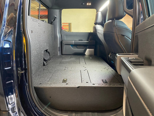 Ford Super Duty Ford - F250-F550 - 2023-Present - 5th Gen. Crew Cab - Second Row Seat Delete Plate System with Factory B&O Subwoofer Center Wall with Exterior Port - Premium Seat Delete Plate System by Xtreme Canopies