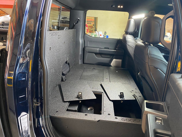 Ford Super Duty Ford - F250-F550 - 2023-Present - 5th Gen. Crew Cab - Second Row Seat Delete Plate System with Factory B&O Subwoofer Center Wall with Exterior Port - Premium Seat Delete Plate System by Xtreme Canopies