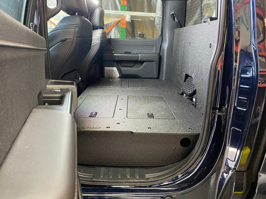 Ford Super Duty Ford - F250-F550 - 2023-Present - 5th Gen. Crew Cab - Second Row Seat Delete Plate System with Factory B&O Subwoofer Center Wall with Exterior Port - Premium Seat Delete Plate System by Xtreme Canopies