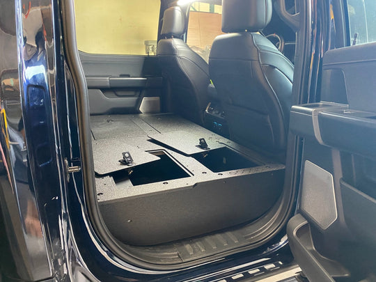 Ford Super Duty Ford - F250-F550 - 2023-Present - 5th Gen. Crew Cab - Second Row Seat Delete Plate System with Factory B&O Subwoofer Center Wall with Exterior Port - Premium Seat Delete Plate System by Xtreme Canopies